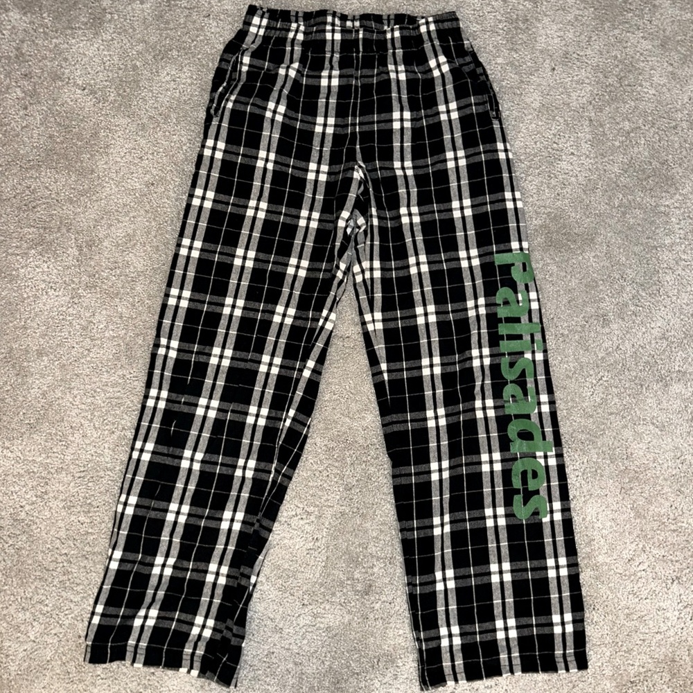 Black and White Plaid Pajama Pants with Green Text